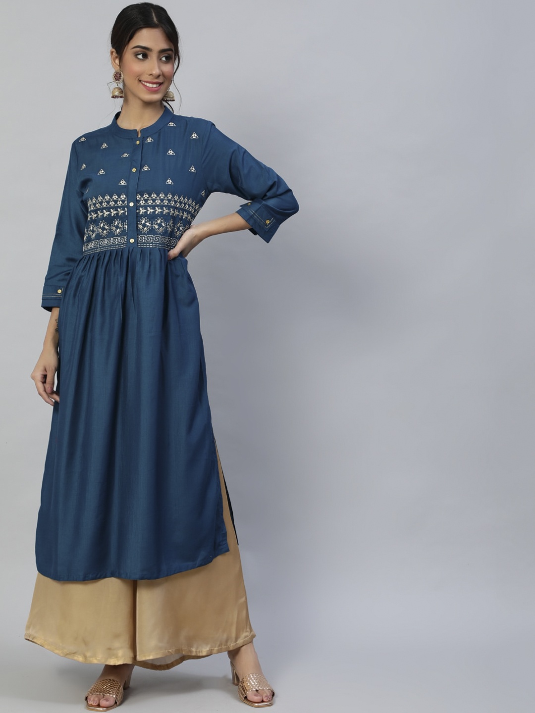 

Anubhutee Women Teal Ethnic Motifs Embroidered Flared Sleeves Kurta