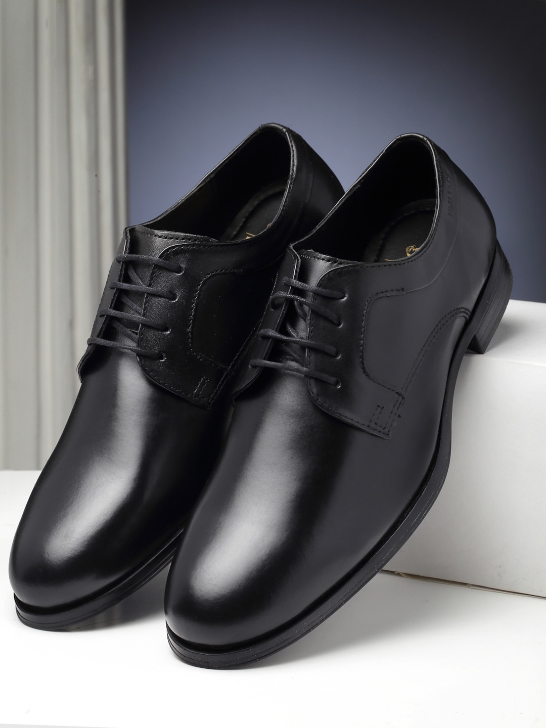 

Red Tape Men Black Solid Leather Formal Derbys