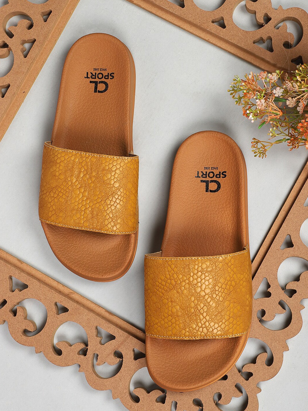 

Carlton London sports Women Tan Self Design Sliders