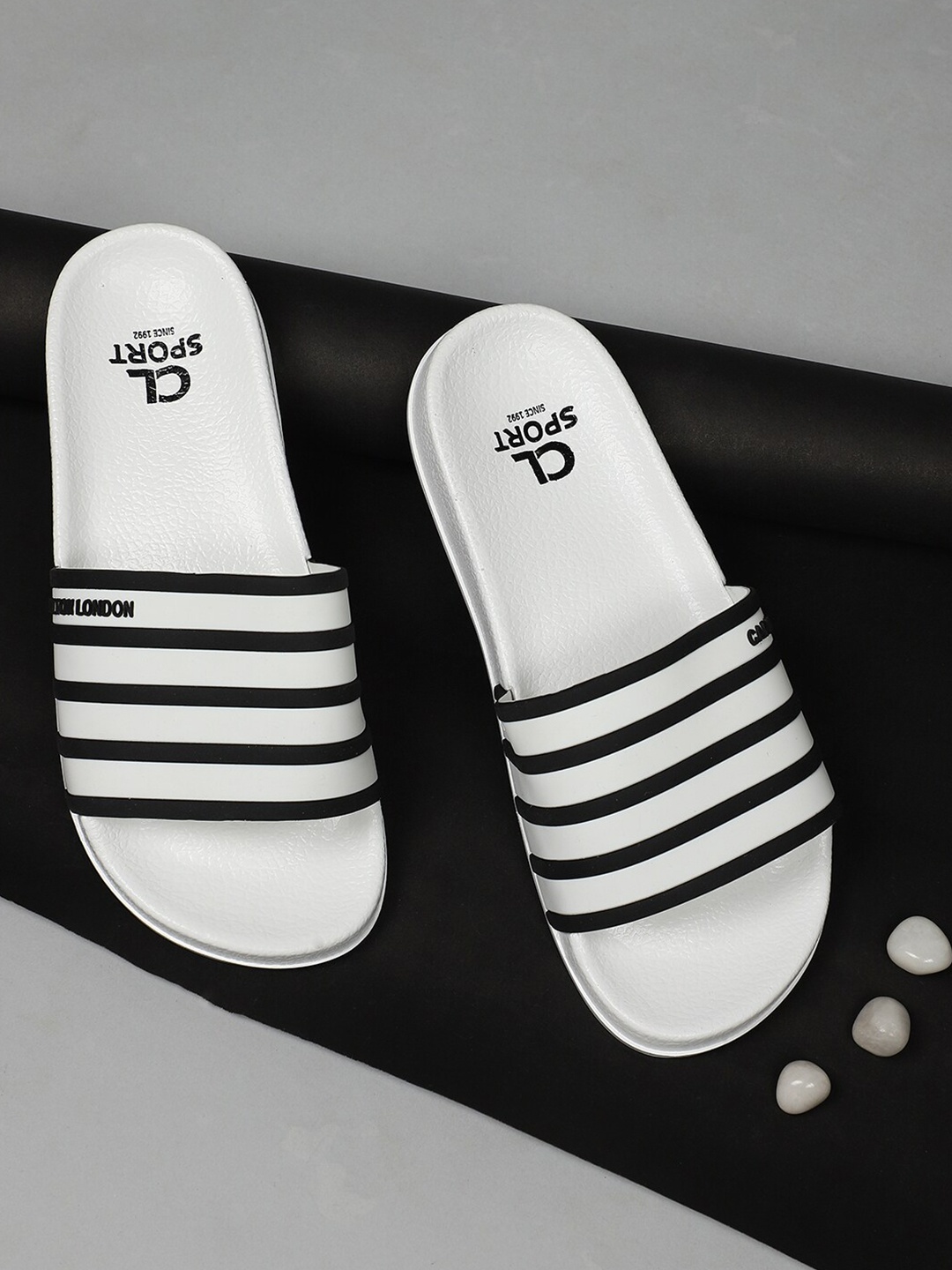 

Carlton London sports Women White & Black Striped Sliders