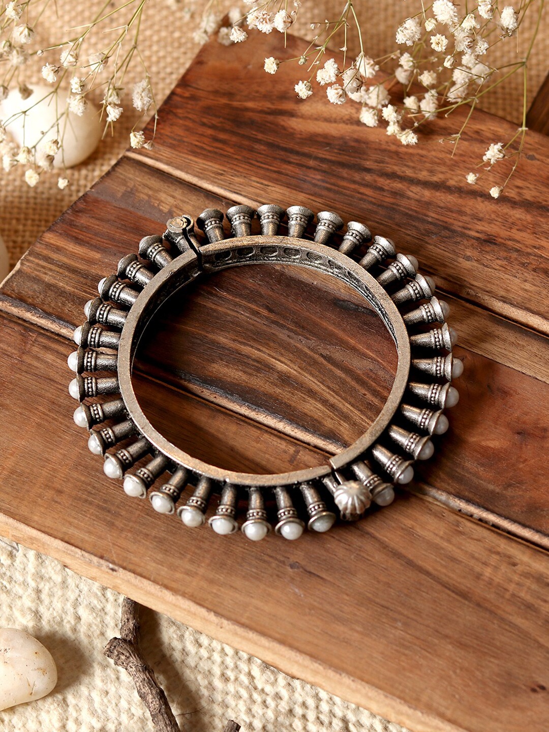 

TEEJH Women Silver-Toned Pearl Studded Oxidized Bangle Style Bracelet