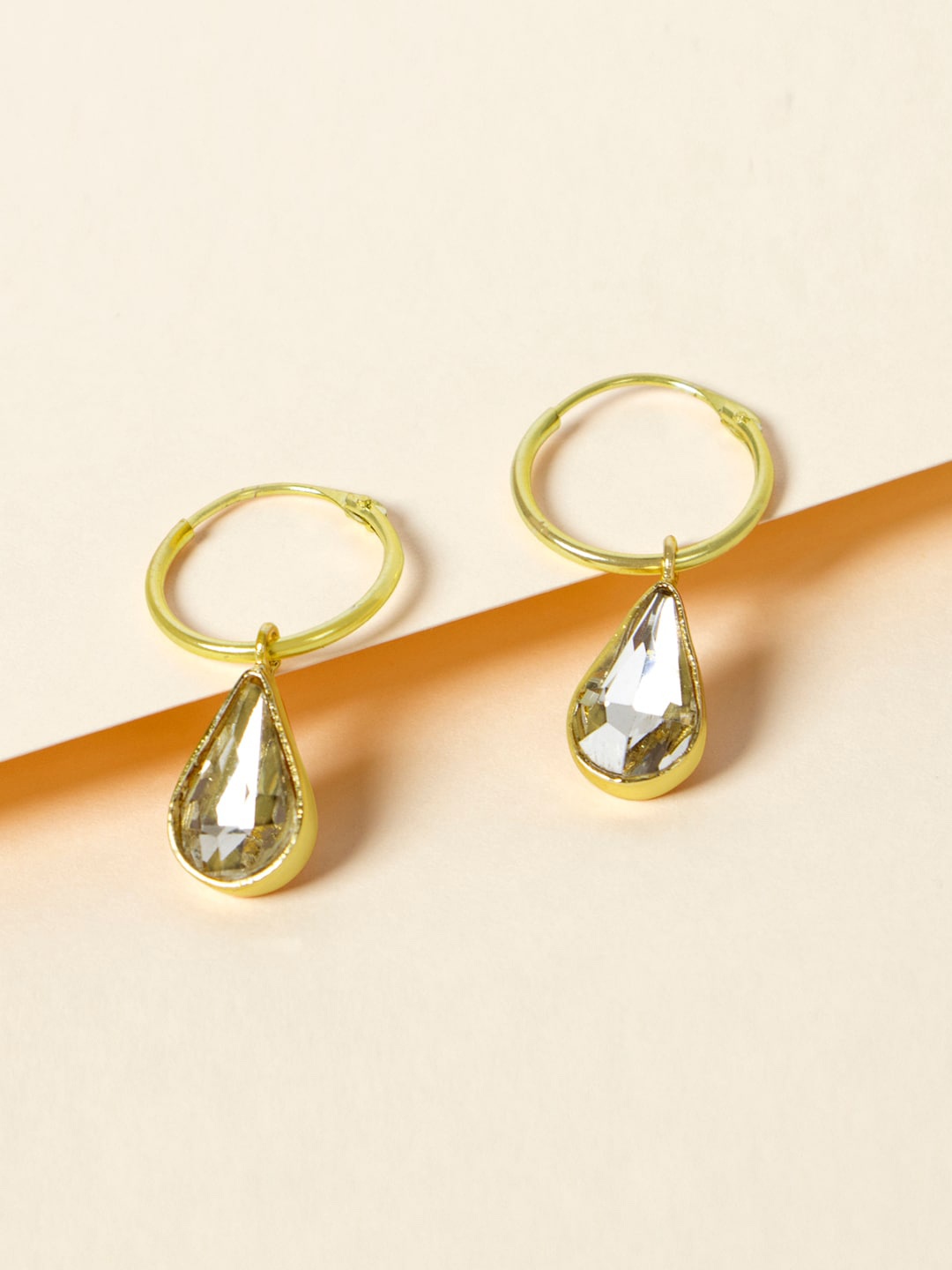 

Mikoto by FableStreet Gold-Toned Teardrop Shaped Hoop Earrings