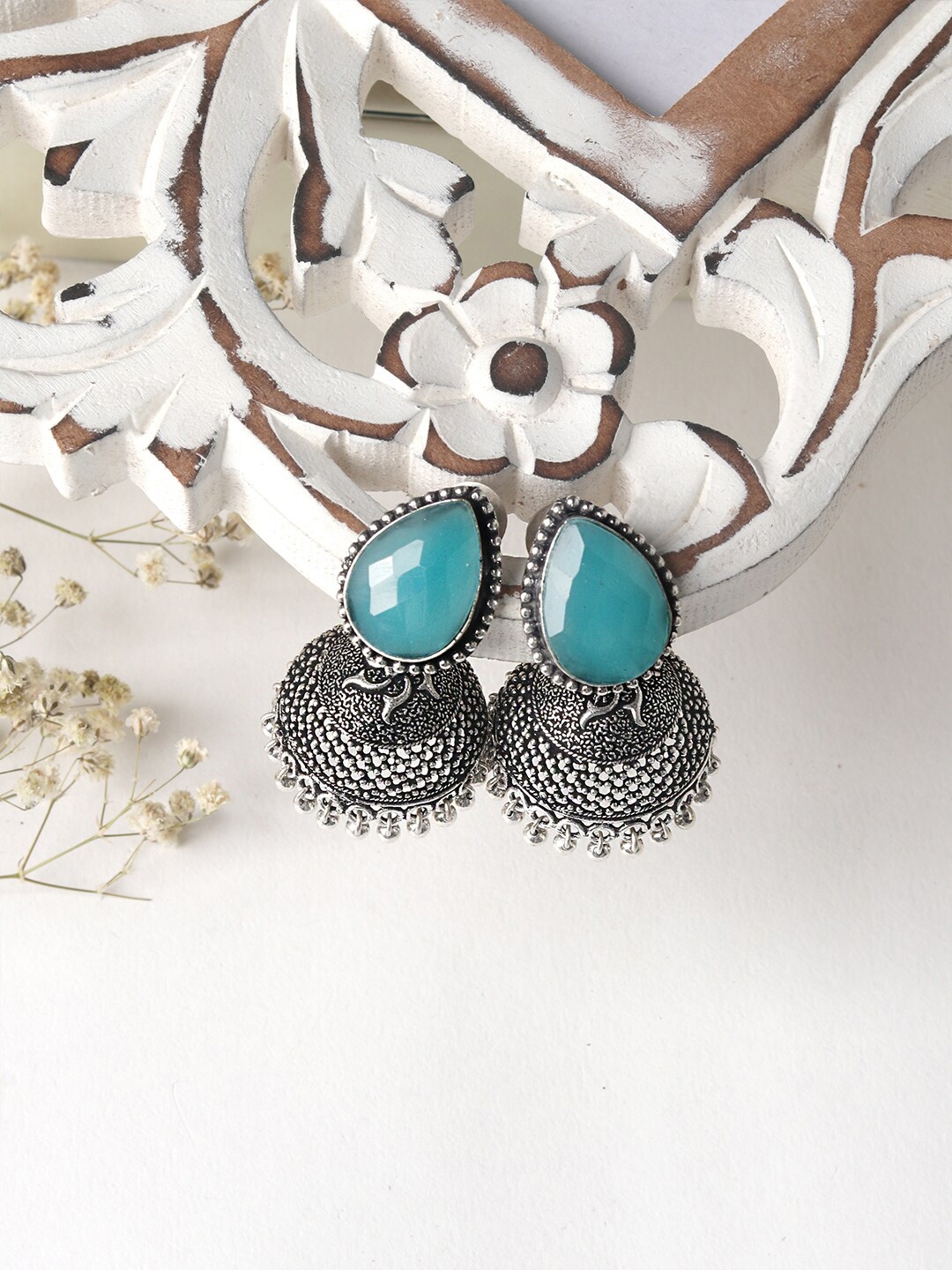 

TEEJH Silver-Toned & Turquoise Blue Contemporary Jhumkas Oxidised Earrings