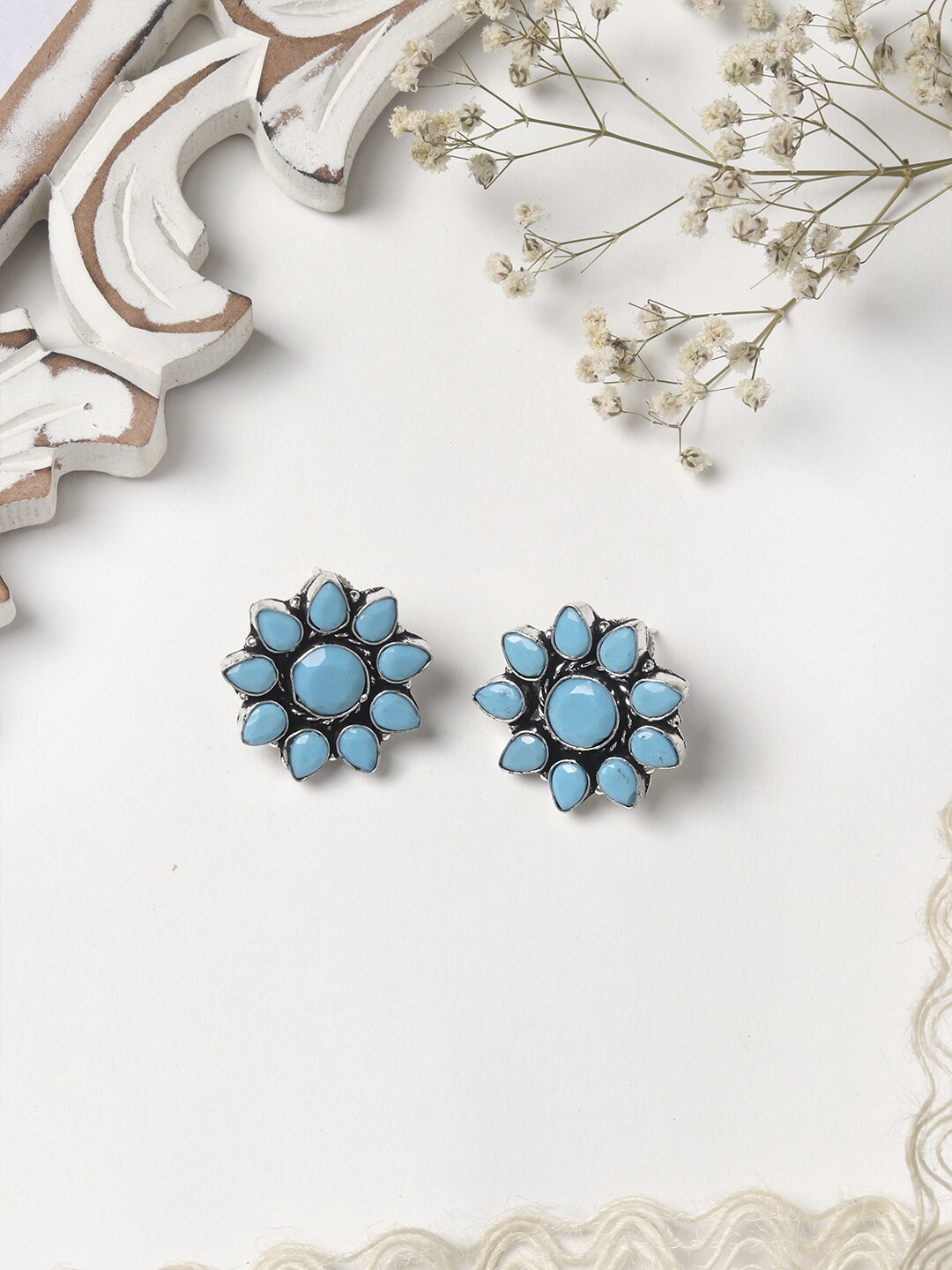 

TEEJH Silver-Toned & Turquoise Blue Floral Studs Earrings