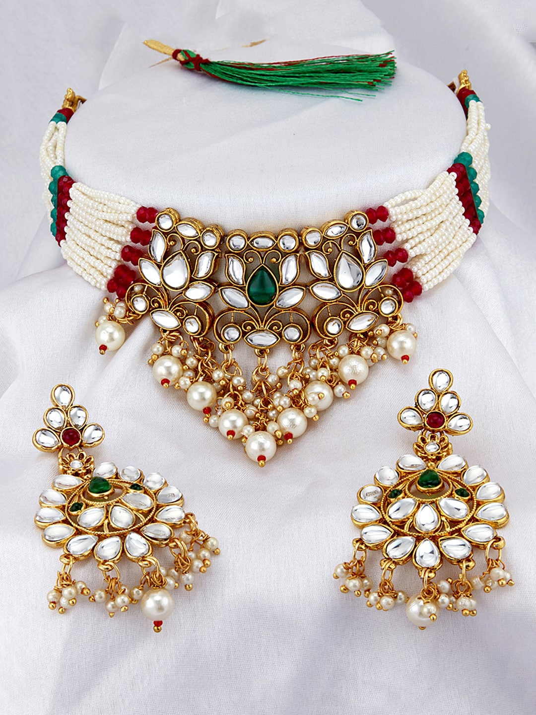 

Sukkhi Gold-Plated White Kundan-Studded Green & Red Pearl Beaded Jadau Jewellery Set