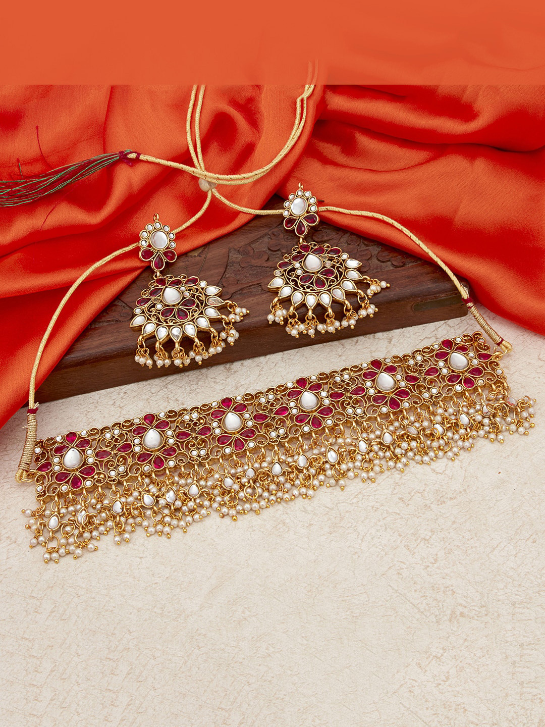 

Sukkhi Gold-Plated Pink & White Kundan Studded & Beaded Jadau Jewellery Set