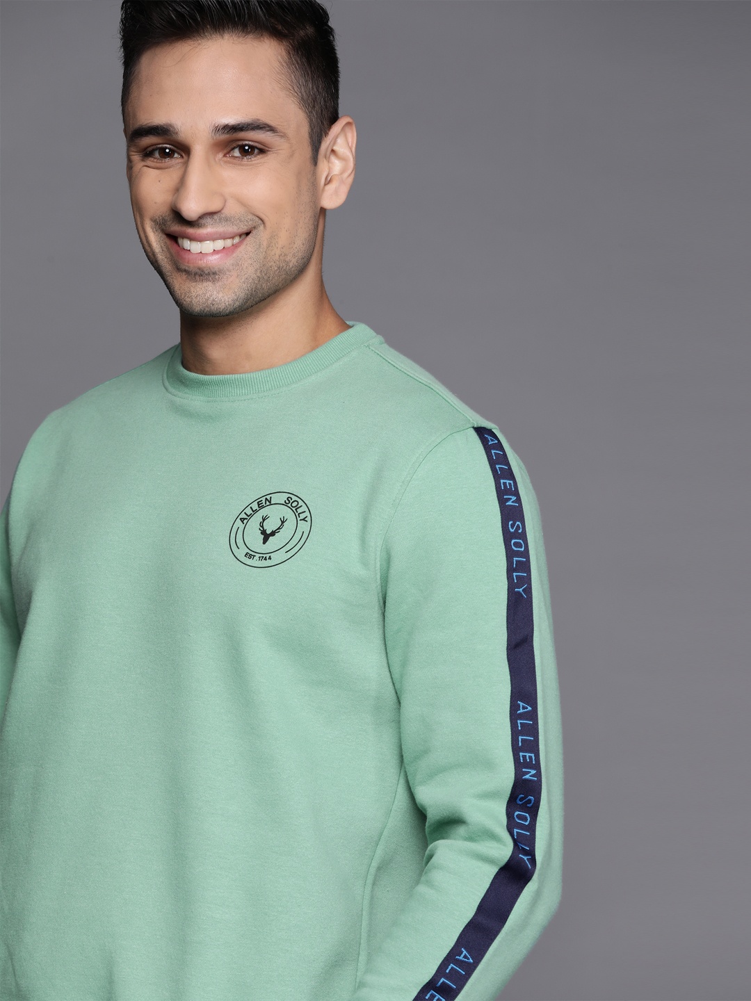 

Allen Solly Men Green Solid Sweatshirt