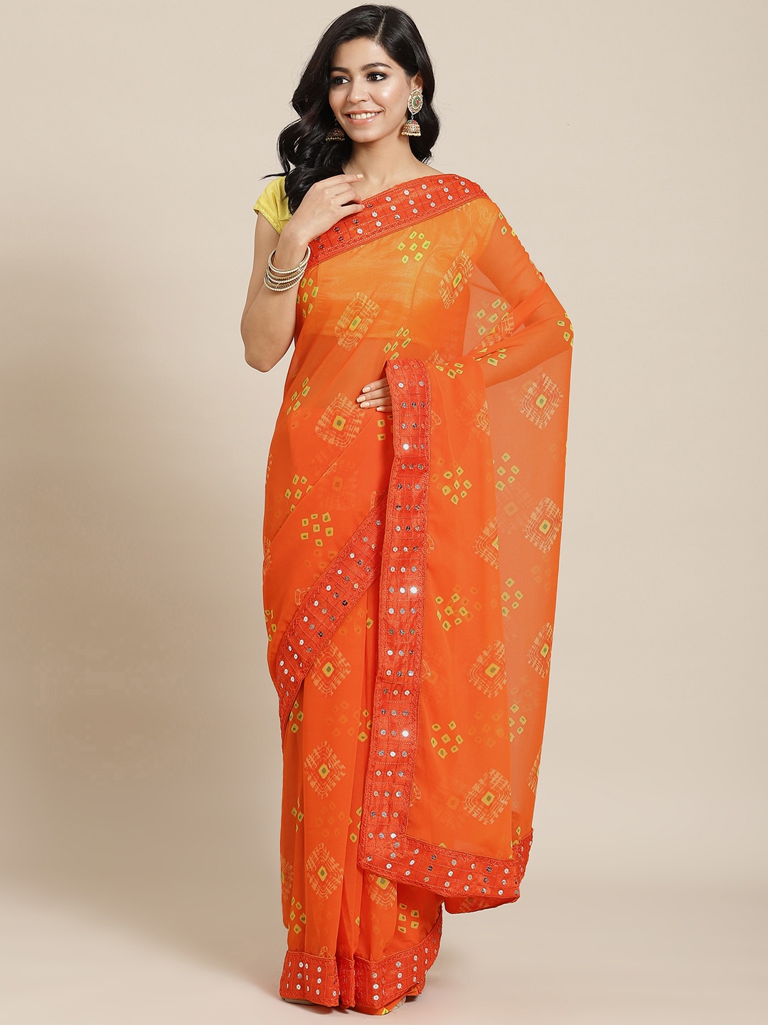 

Mitera Orange Bandhani Printed Mirror Work Saree