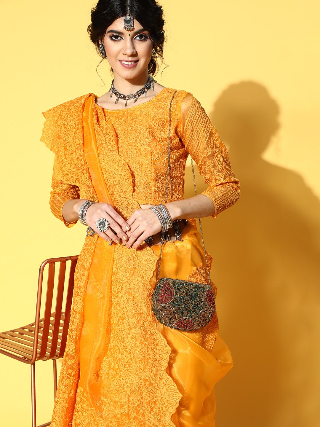 

Mitera Ethnic Motifs Saree with Embroidered Border, Mustard