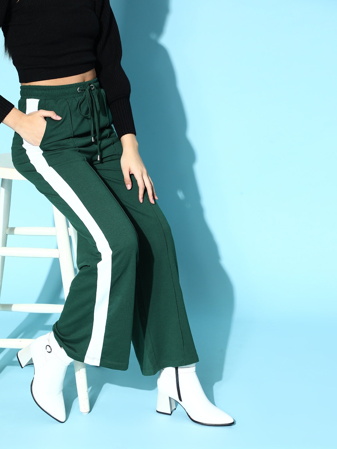 

COVER STORY Women Gorgeous Green Solid Flared Trousers