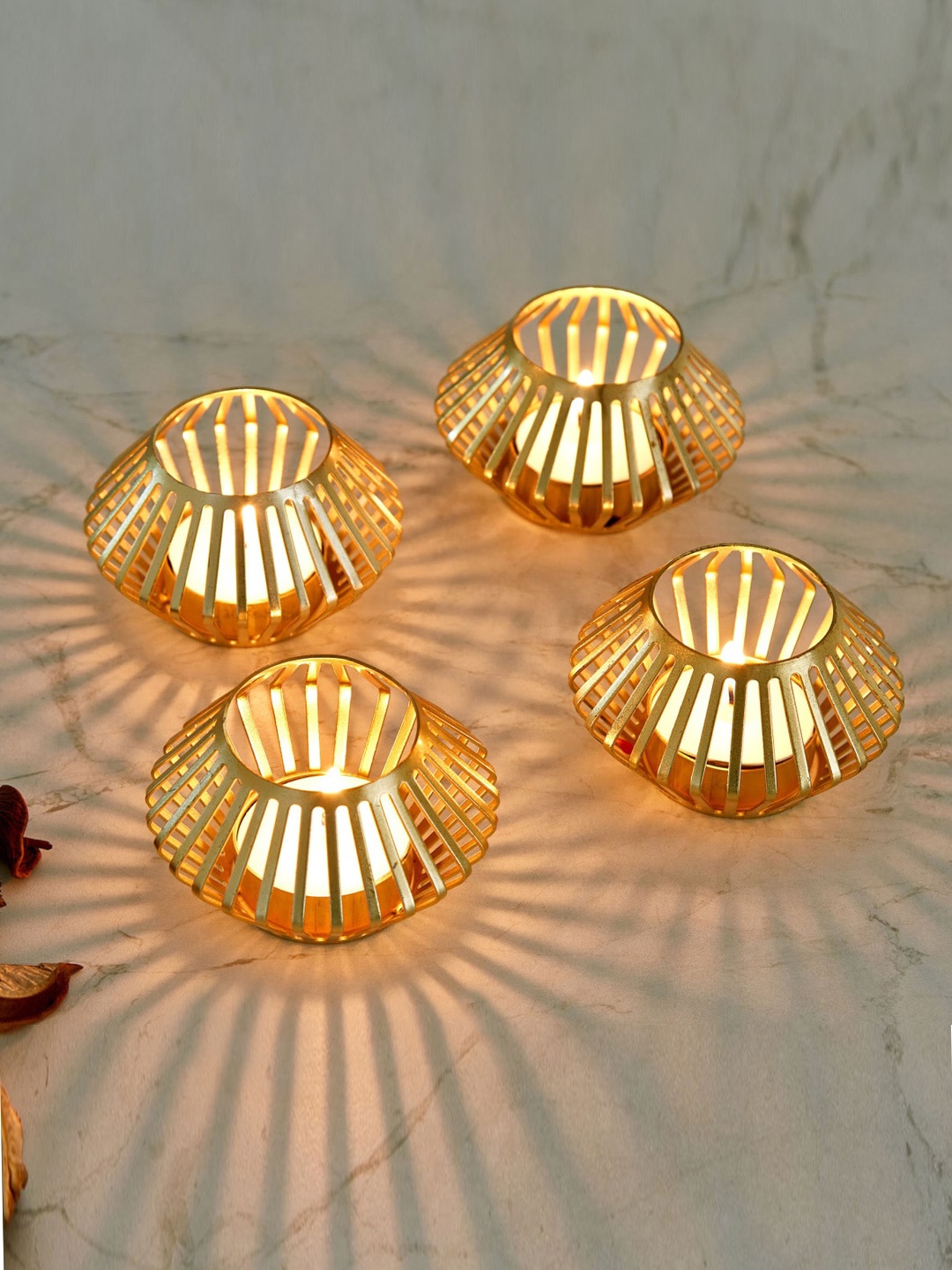 

Home Centre Set of 4 Assorted Metal T-Light Holder