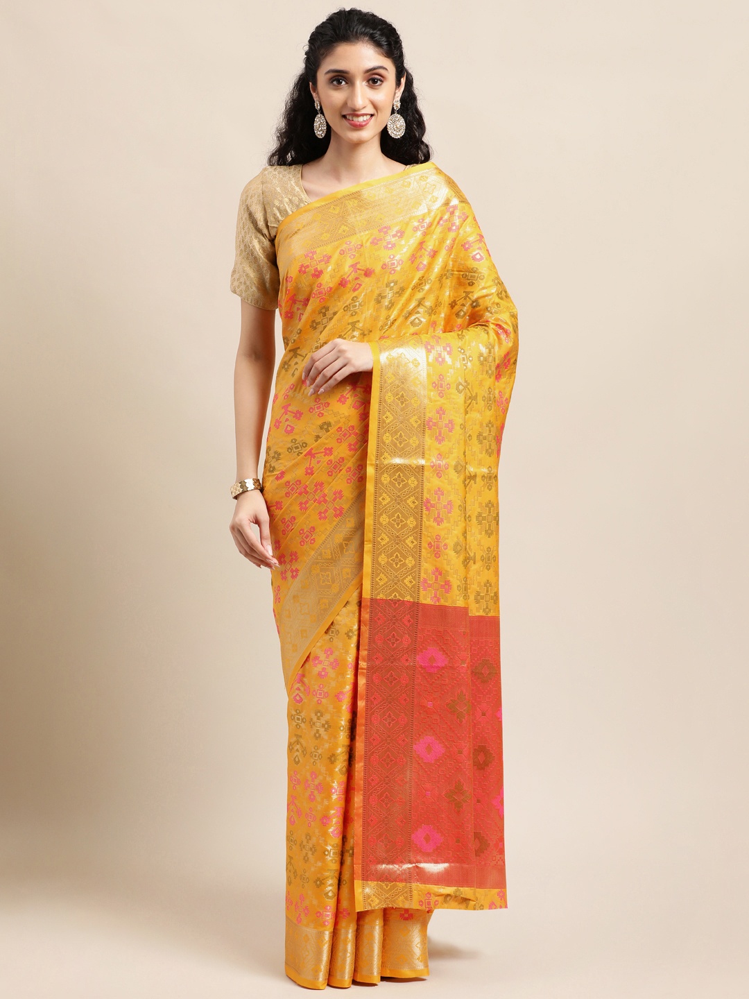 

Mitera Yellow Ethnic Motifs Zari Silk Blend Patola Saree