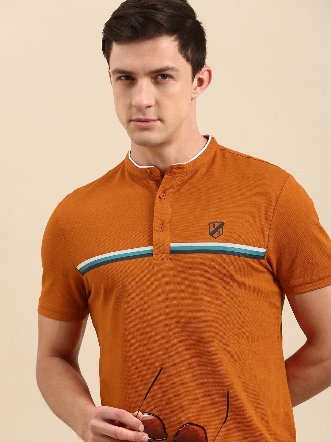 

Being Human Men Orange & White Striped Henley Neck T-shirt