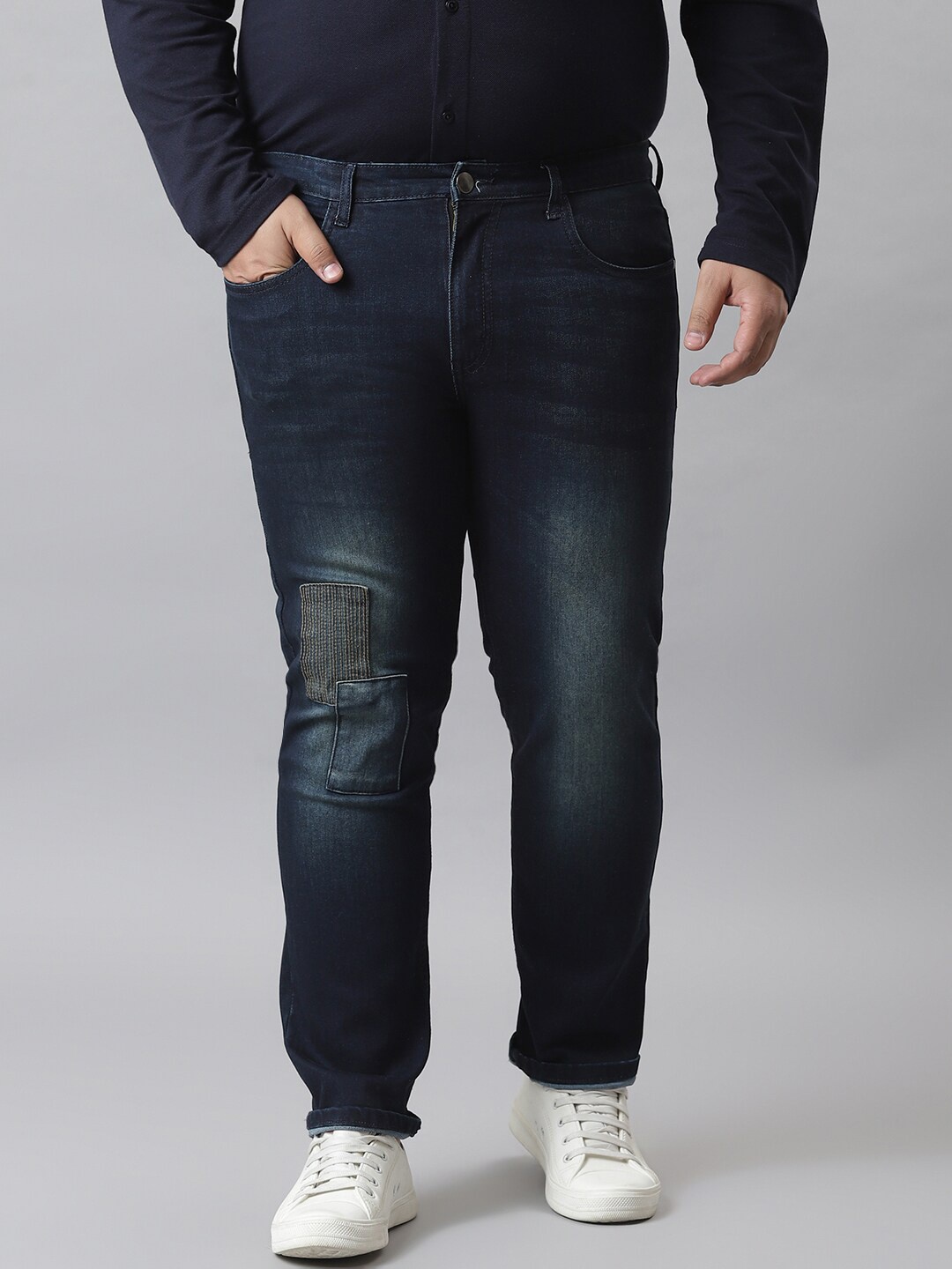 

Instafab Plus Men Navy Blue Mildly Distressed Light Fade Jeans