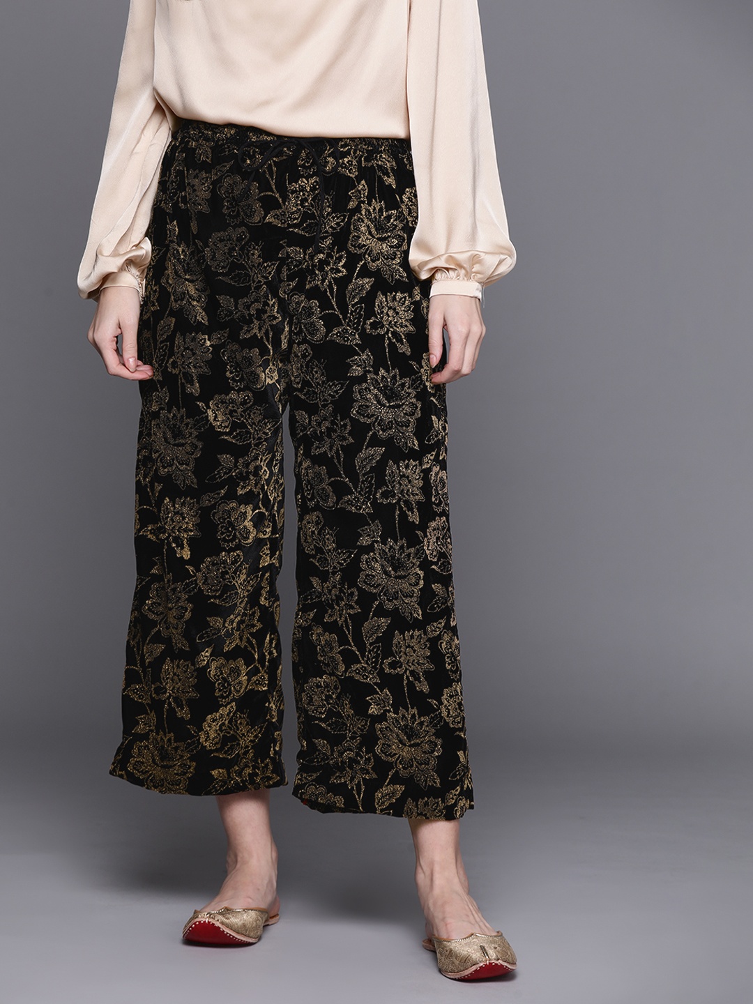 

Biba Women Black & Golden Ethnic Motifs Printed Ethnic Palazzos