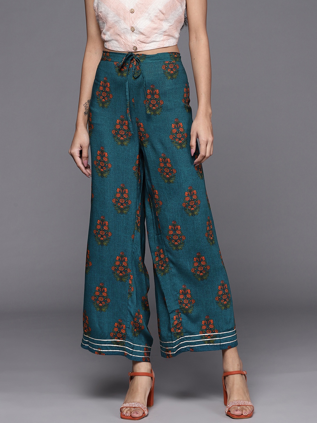 

Biba Women Teal Green & Orange Ethnic Motifs Printed Ethnic Palazzos