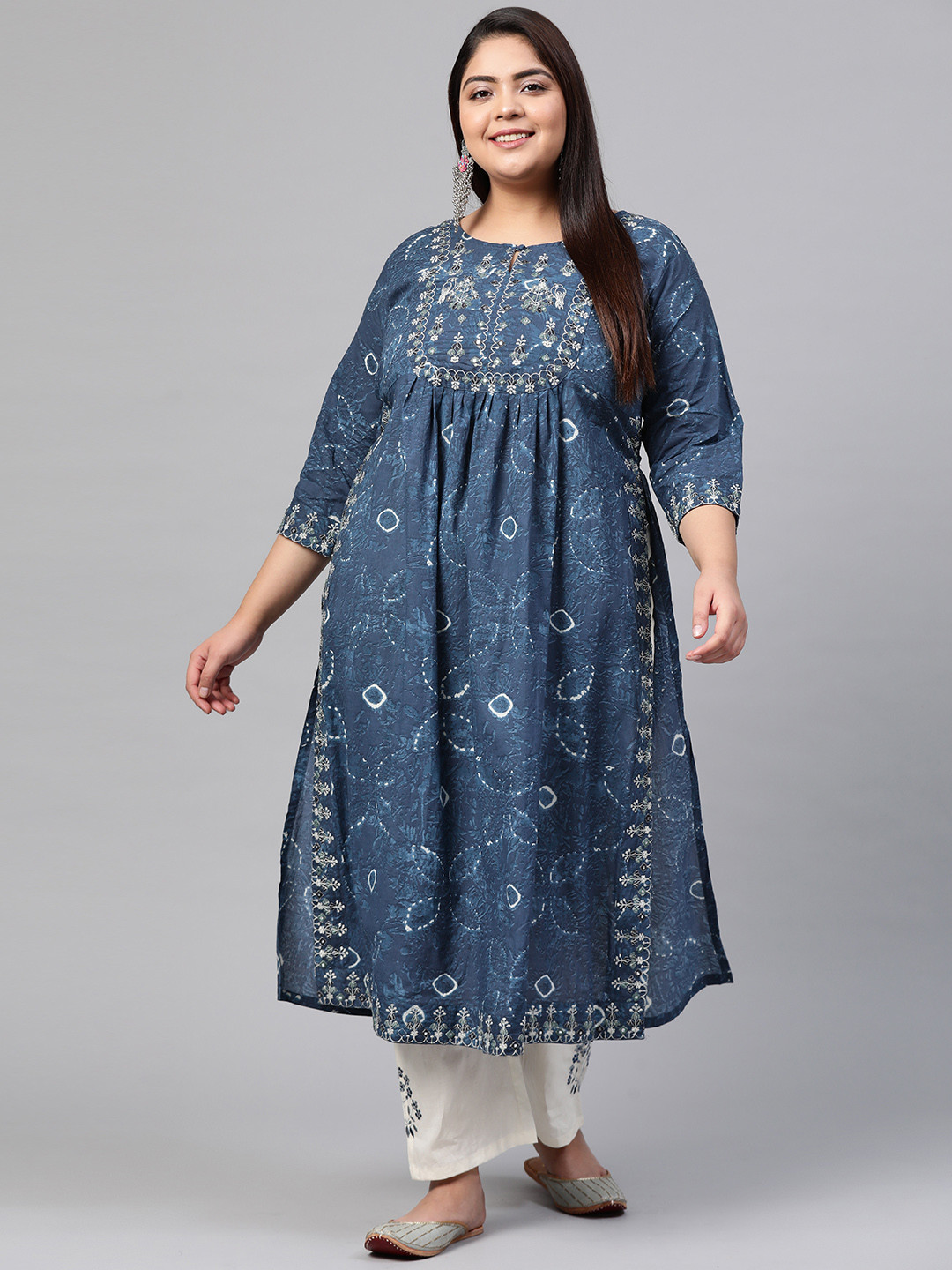 

Divena Women Blue Ethnic Motifs Embroidered Regular Pure Cotton Kurta with Trousers