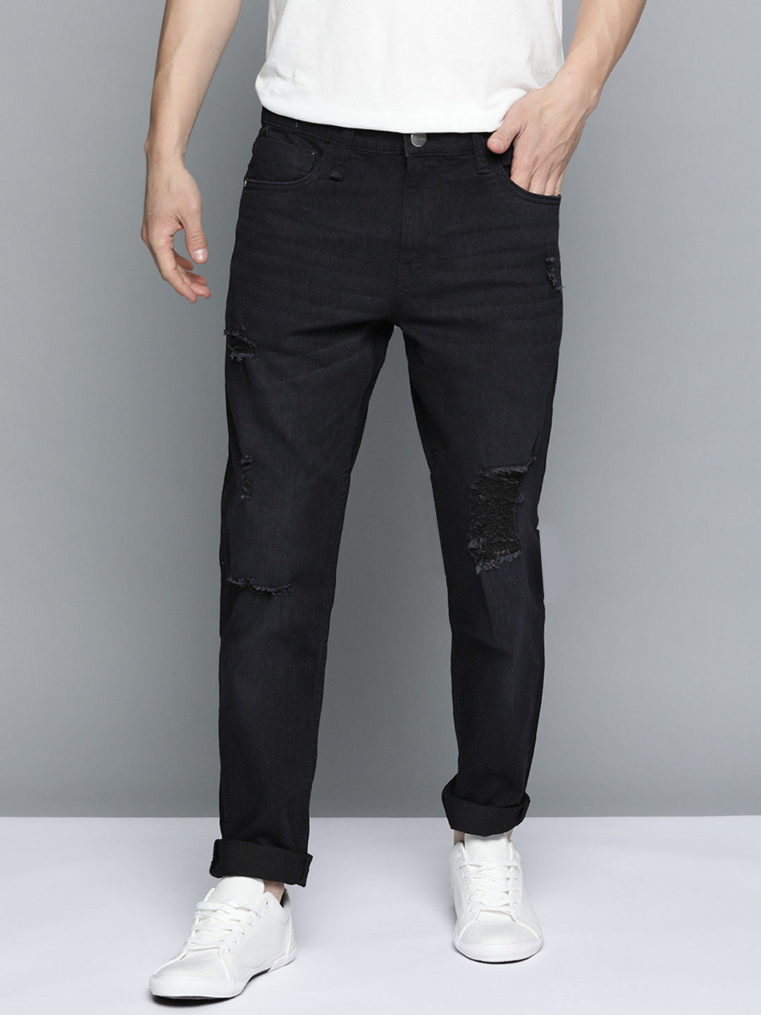 

Mast & Harbour Men Black Carrot Fit Mildly Distressed Light Fade Stretchable Jeans