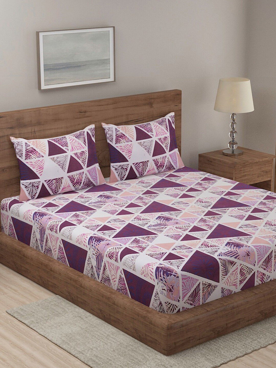 

Niamh by Tag 7 Purple & White Printed Cotton144 TC King Bedsheet with 2 Pillow Covers