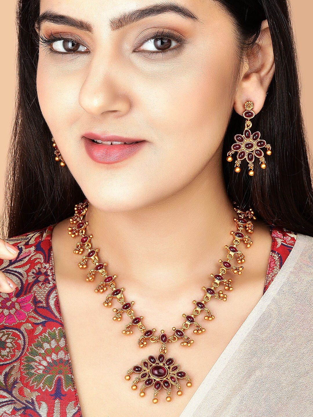

Rubans Women 24K Gold Plated Green and Red Stones Studded Jewellery Set