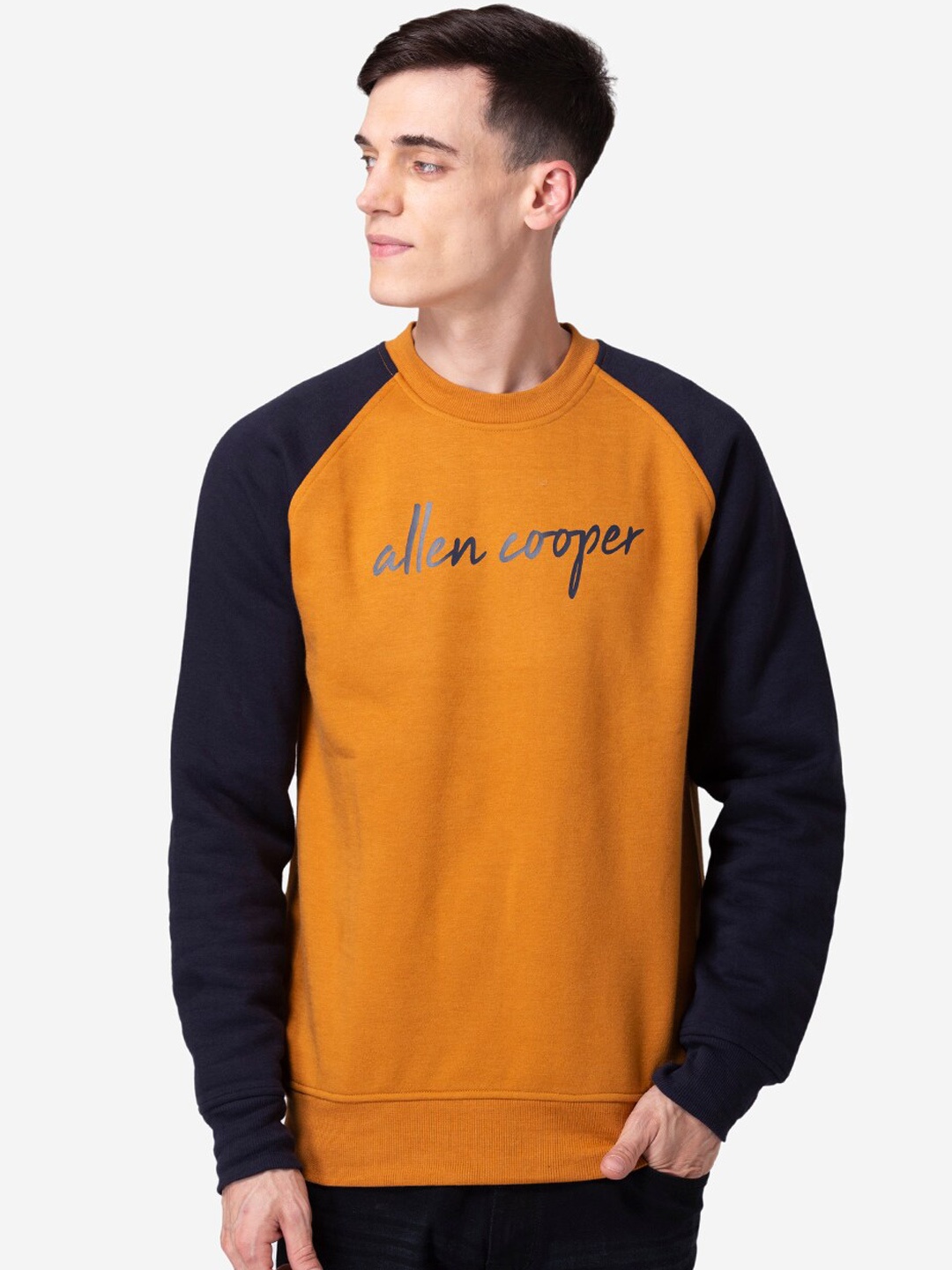 

Allen Cooper Men Rust & Navy Blue Colourblocked Sweatshirt