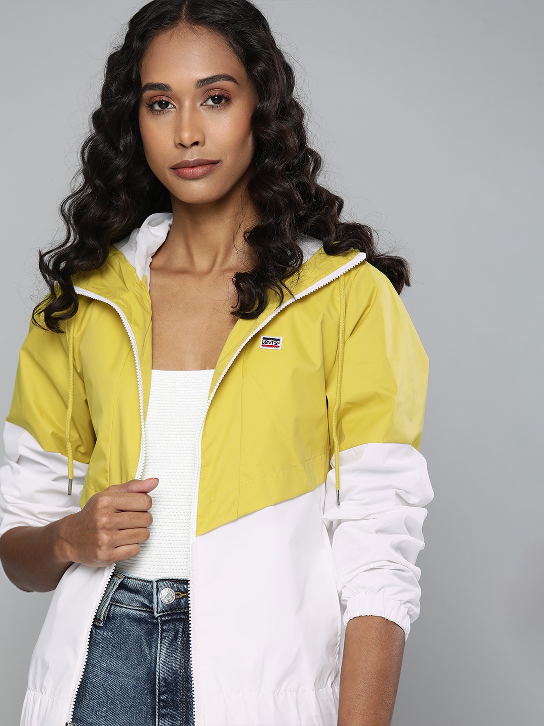 

Levis Women Lime Green & White Colourblocked Windcheater Hooded Sporty Jacket
