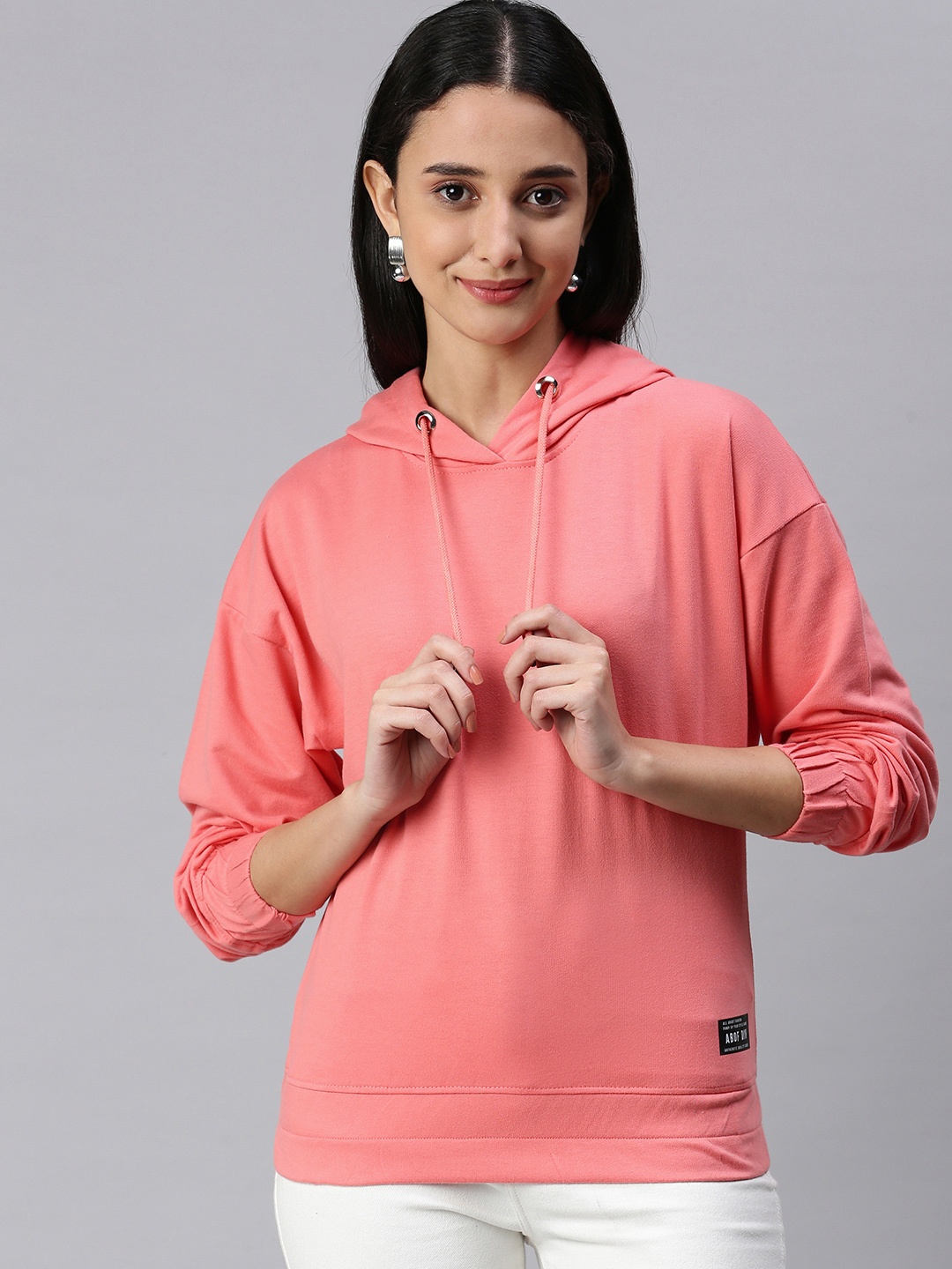 

abof Women Peach-Coloured Solid Hooded Sweatshirt