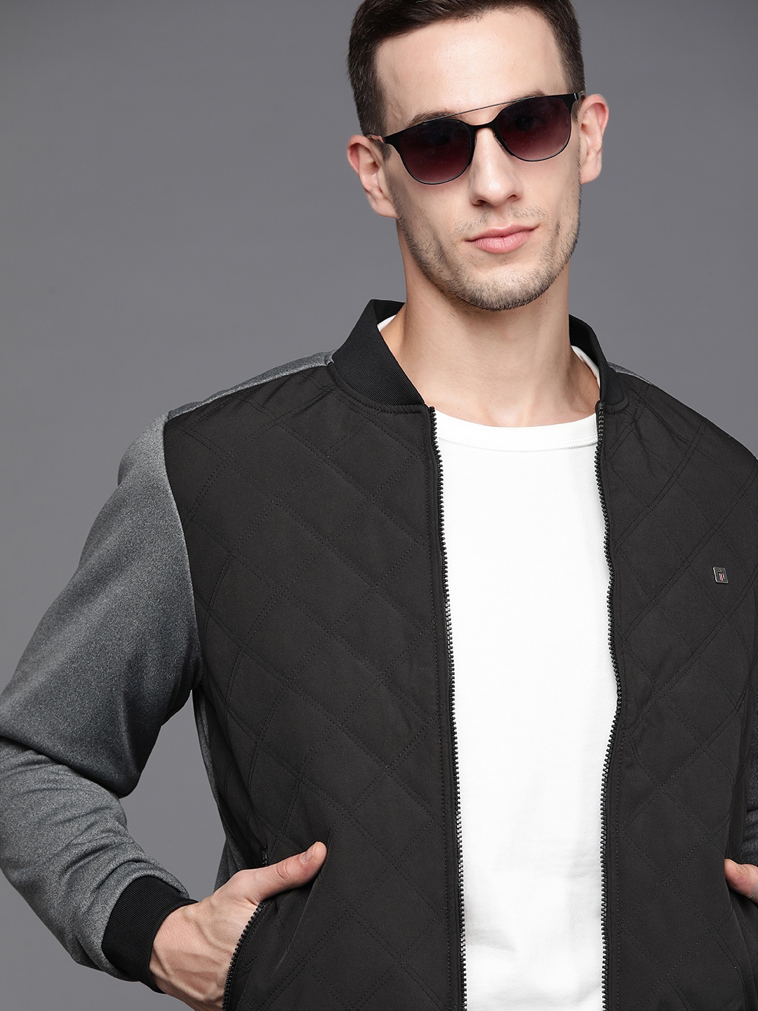 

Louis Philippe Jeans Men Black Solid Bomber Jacket