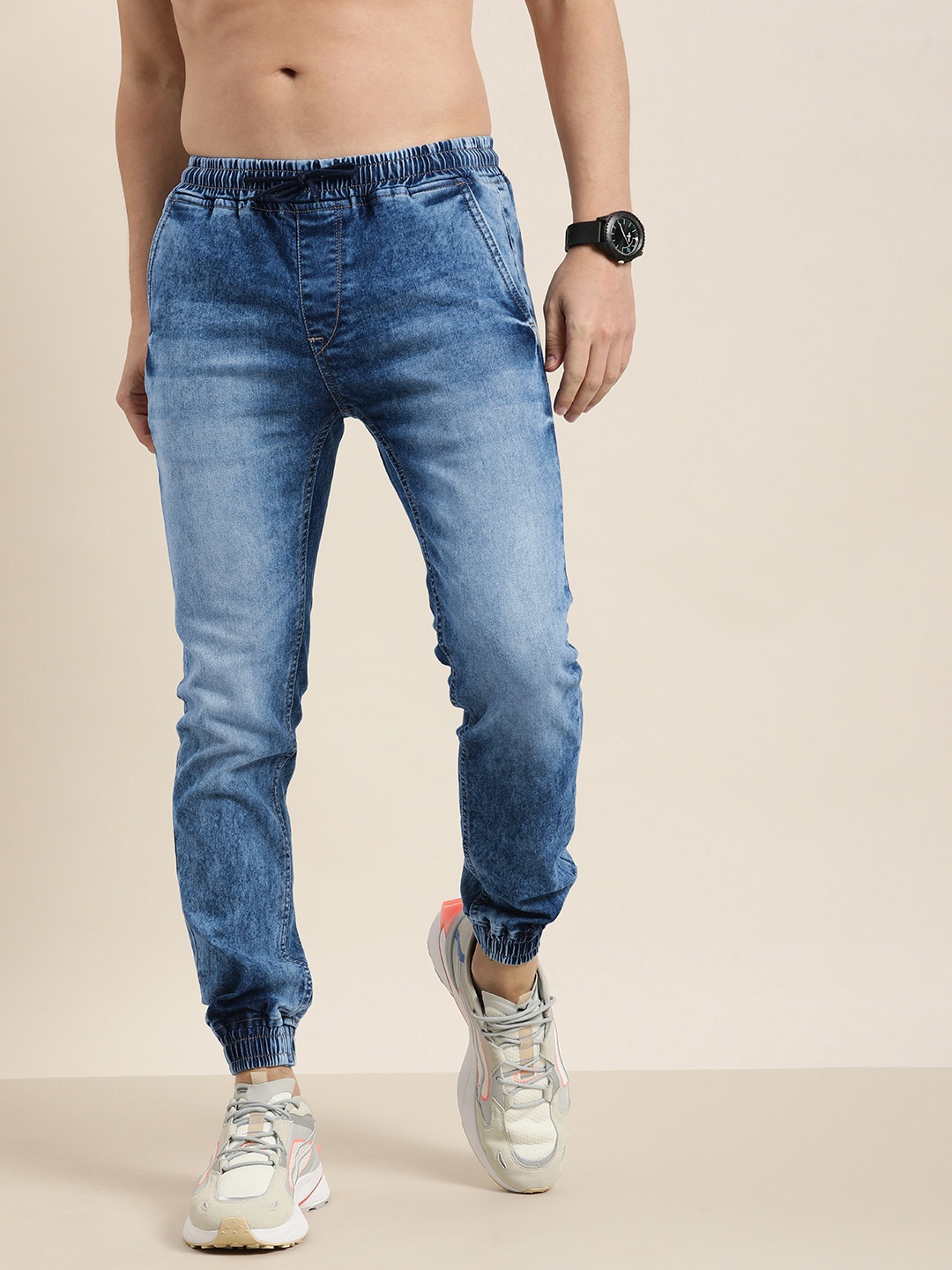 

Moda Rapido Men Blue Mid-Rise Jogger-Fit Heavy Fade Acid Wash Jeans