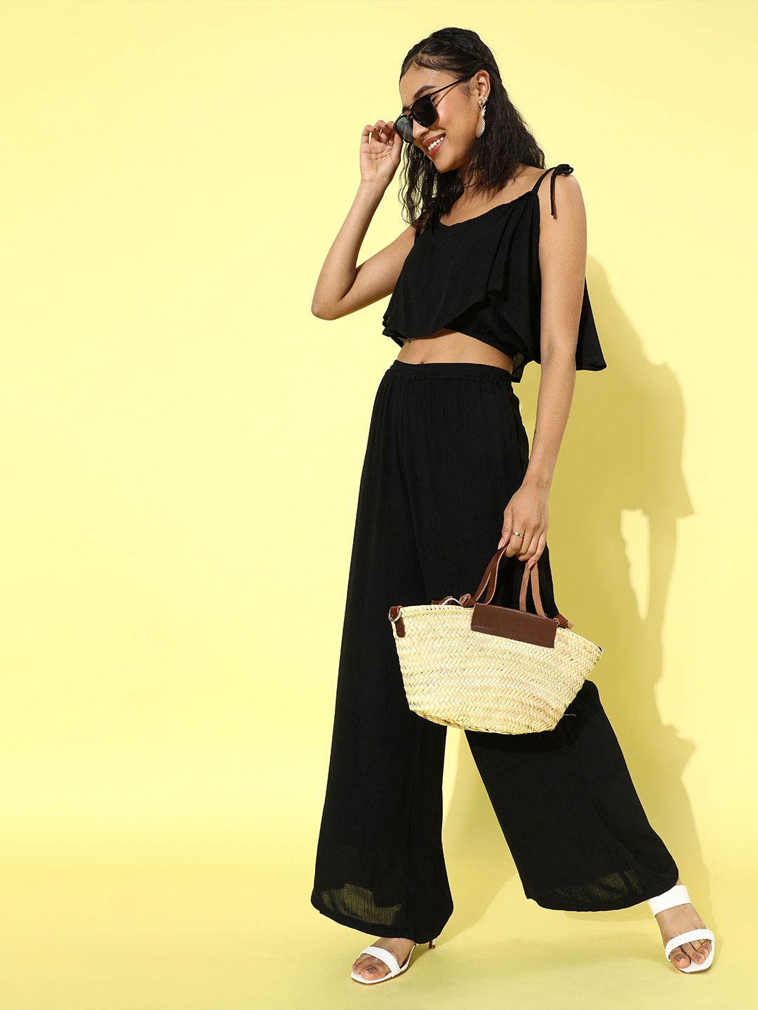 

Cation Woman Stylish Black Solid Top with Palazzos