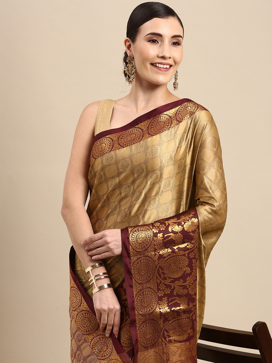 

Anouk Beige Ethnic Motifs Zari Pure Silk Banarasi Saree