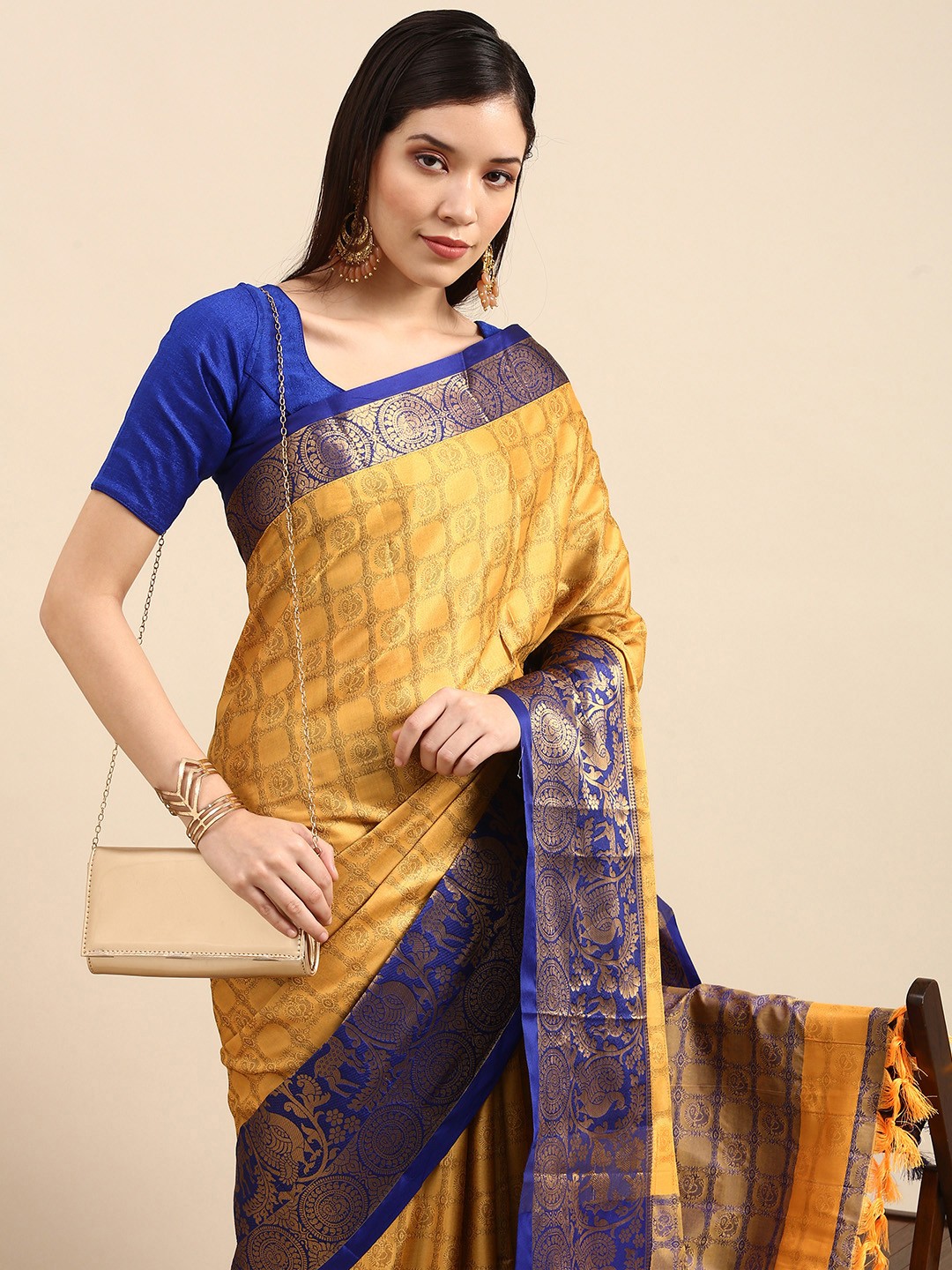 

Anouk Yellow Ethnic Motifs Zari Pure Silk Banarasi Saree