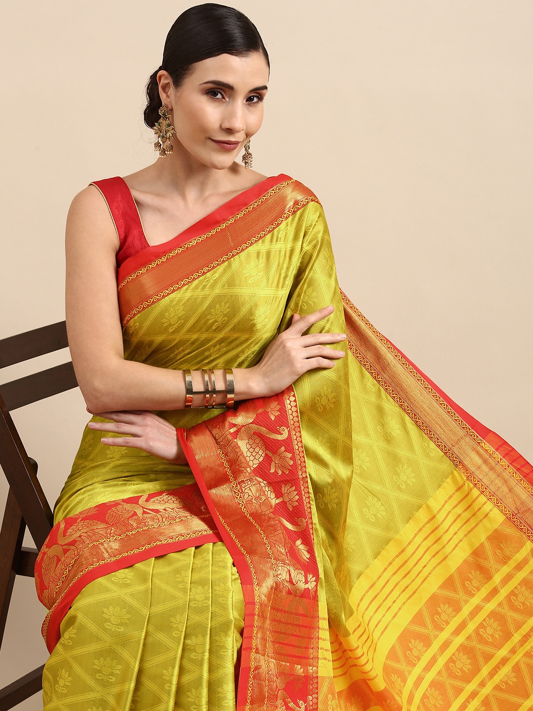 

Anouk Olive Green Ethnic Motifs Zari Pure Silk Kanjeevaram Saree