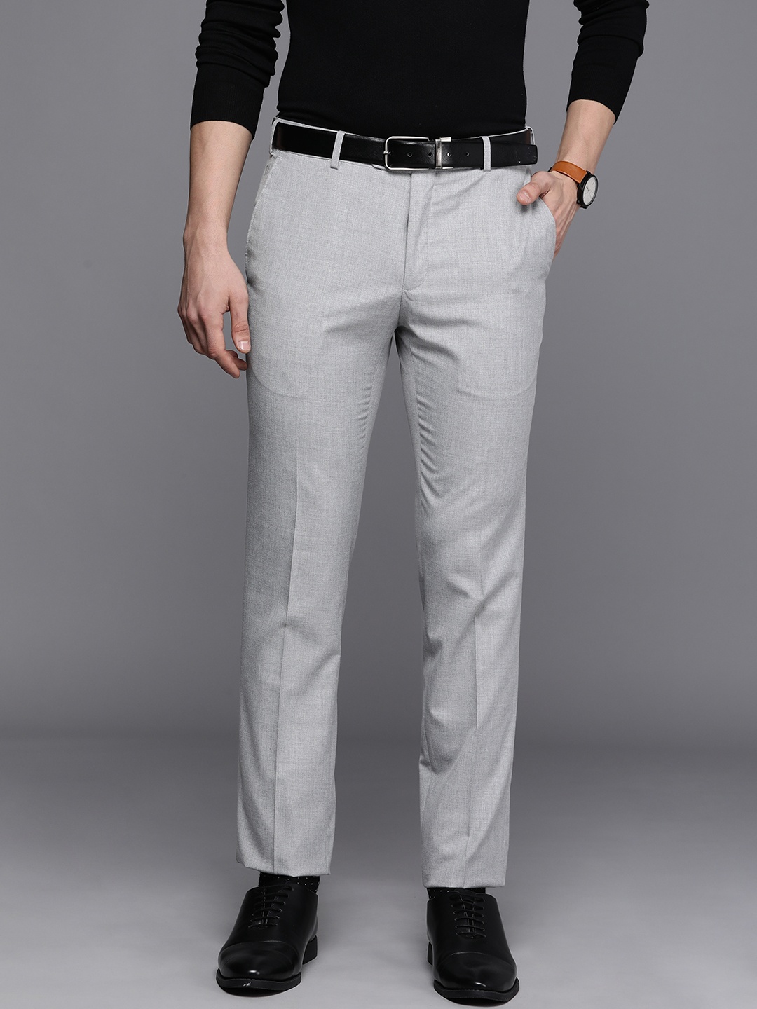 

Raymond Men Grey Solid Mid Rise Slim Fit Formal Trousers