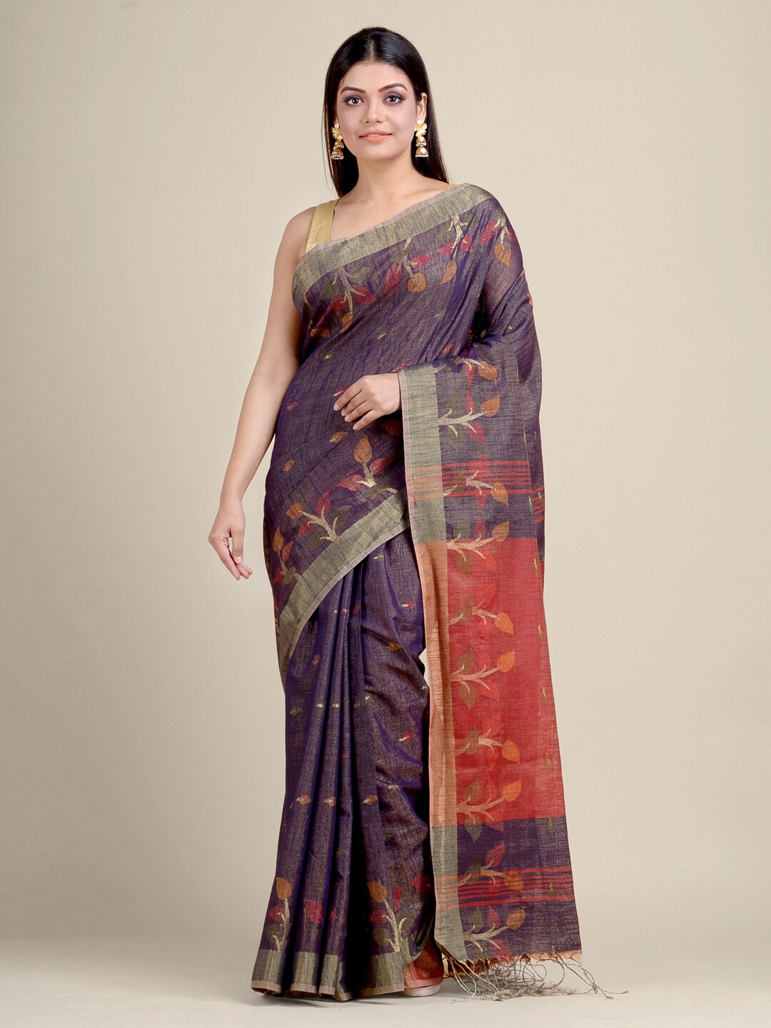 

Charukriti Purple & Red Ethnic Motifs Zari Saree