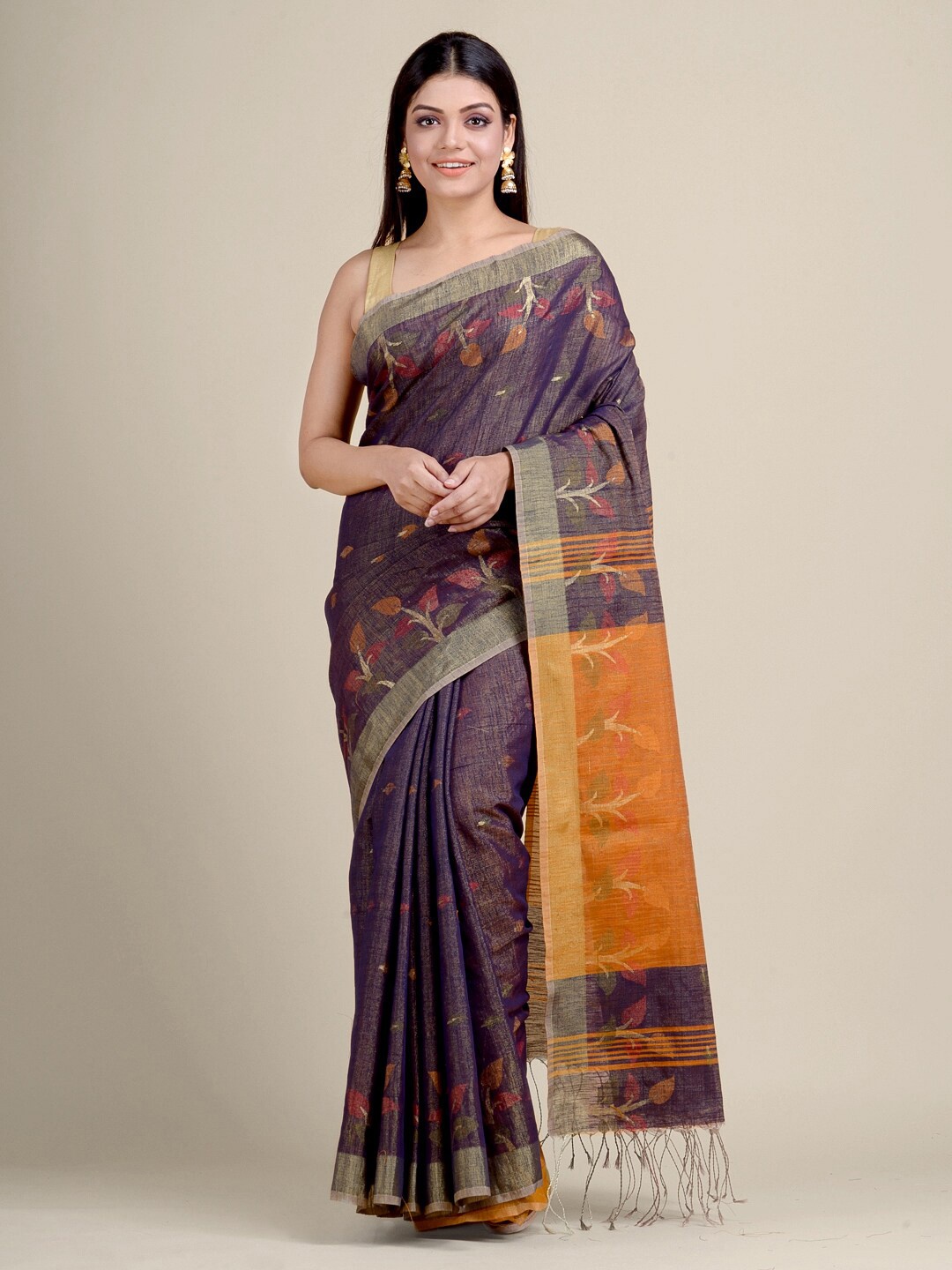 

Charukriti Purple & Orange Floral Zari Saree