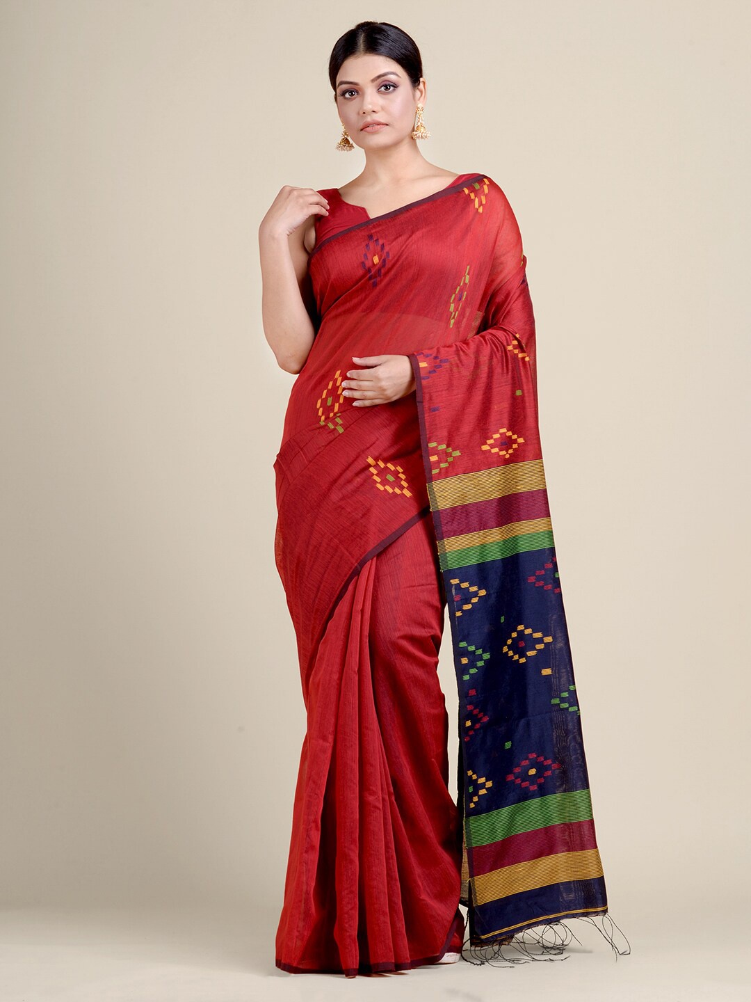 

Charukriti Red & Blue Ethnic Motifs Woven Saree