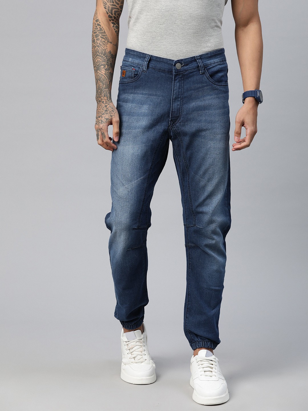 

Campus Sutra Men Light Fade Stretchable Joggers Jeans, Blue