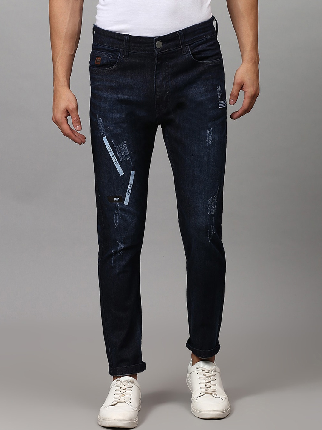 

Campus Sutra Men Navy Blue Slim Fit Low Distress Light Fade Stretchable Jeans