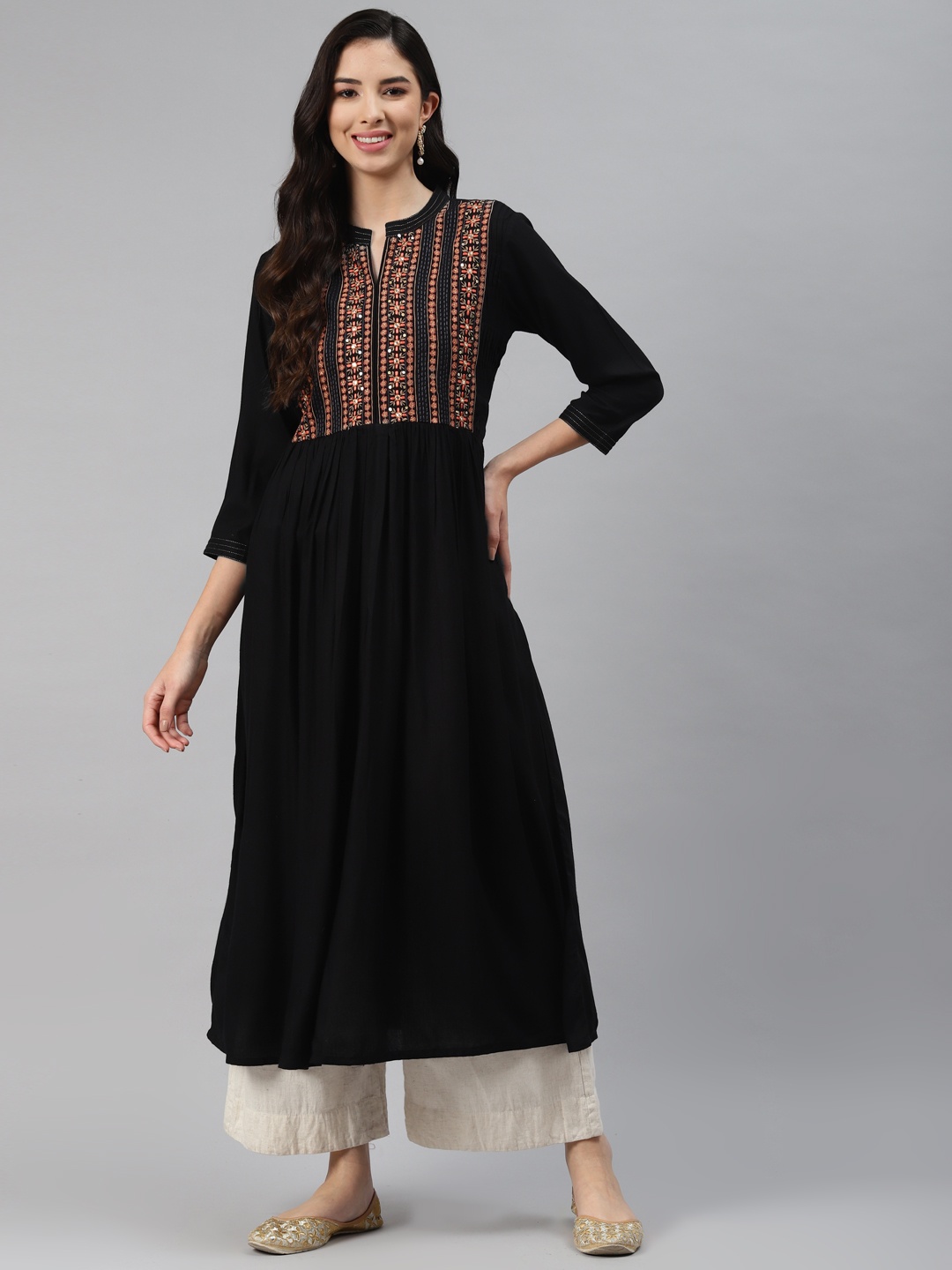 

Silai Bunai Women Black Ethnic Motifs Yoke Design Empire Thread Work Kurta with Palazzos