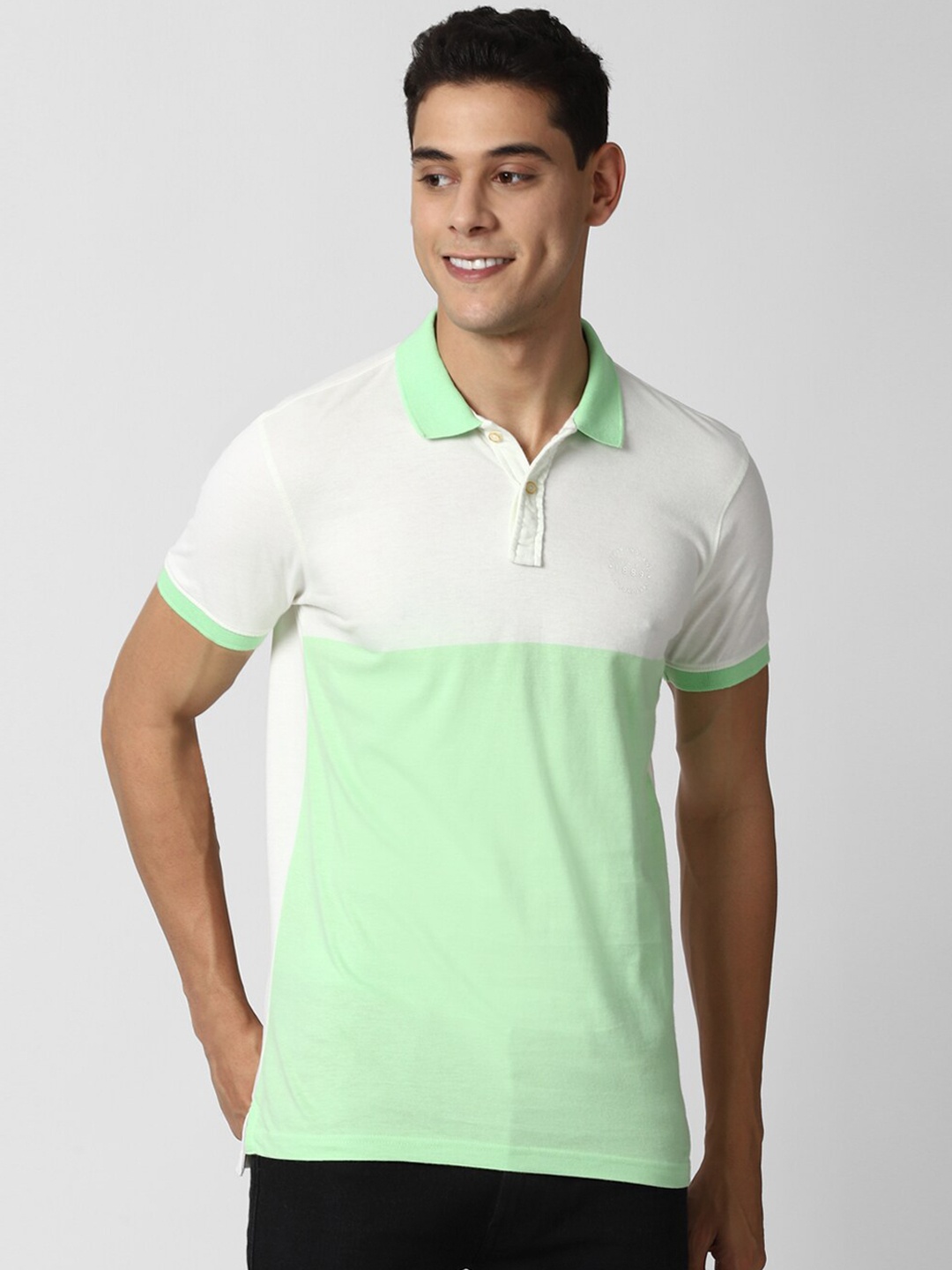 

Peter England Casuals Men Green & White Colourblocked Polo Collar T-shirt