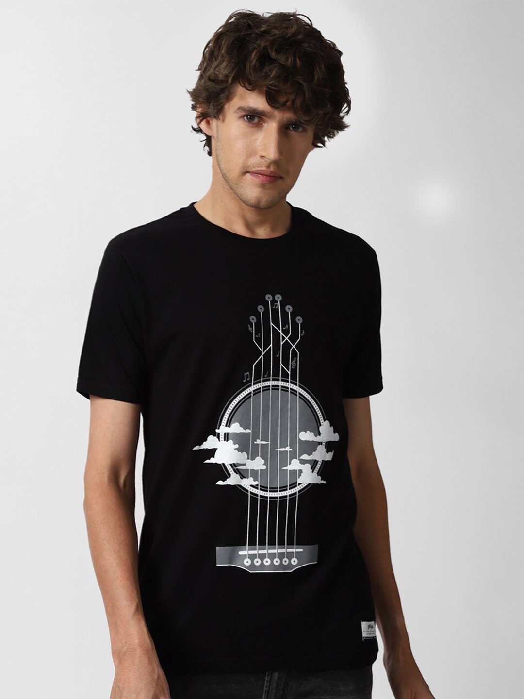 

Peter England Casuals Men Black Printed Raw Edge T-shirt