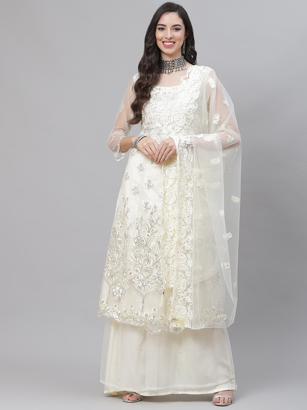 

Readiprint Fashions Off White Embroidered Unstitched Dress Material