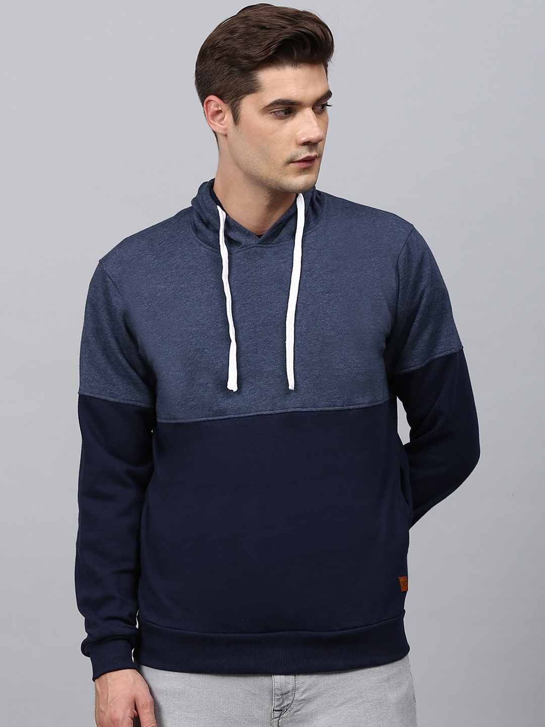 

Campus Sutra Men Blue Colourblocked Hooded Sweatshirt