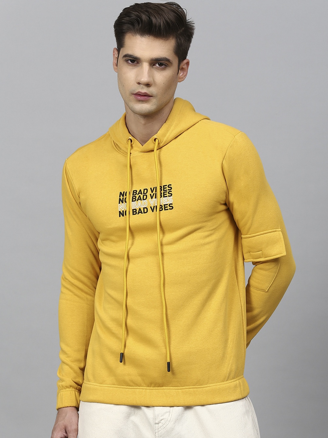 

Campus Sutra Men Yellow Printed Hooded Sweatshirt