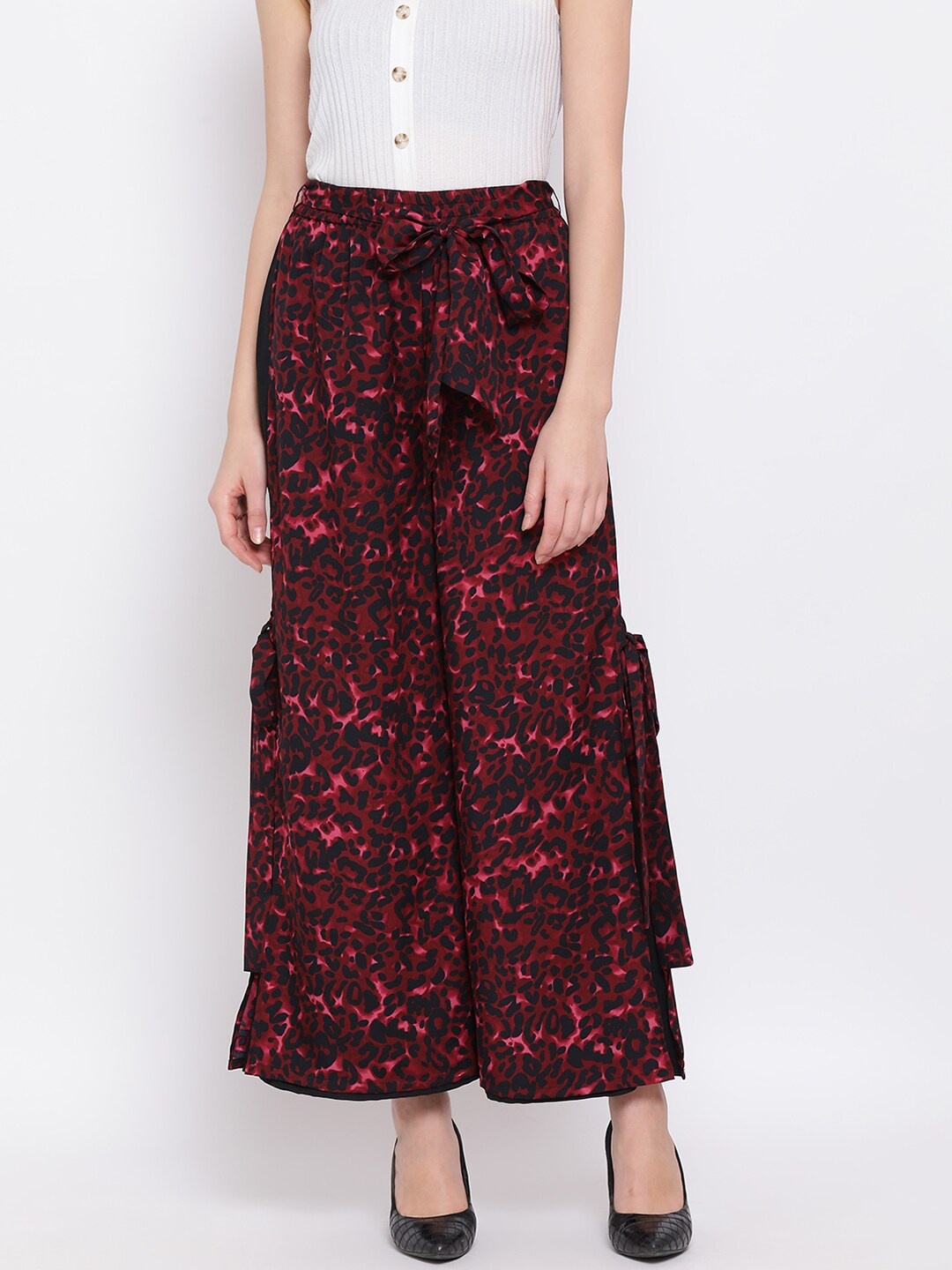 

DRAAX Fashions Women Maroon & Pink Animal Printed Flared Palazzos