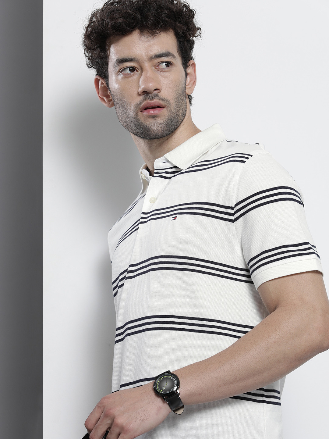 

Tommy Hilfiger Men White & Navy Blue Striped Polo Collar T-shirt