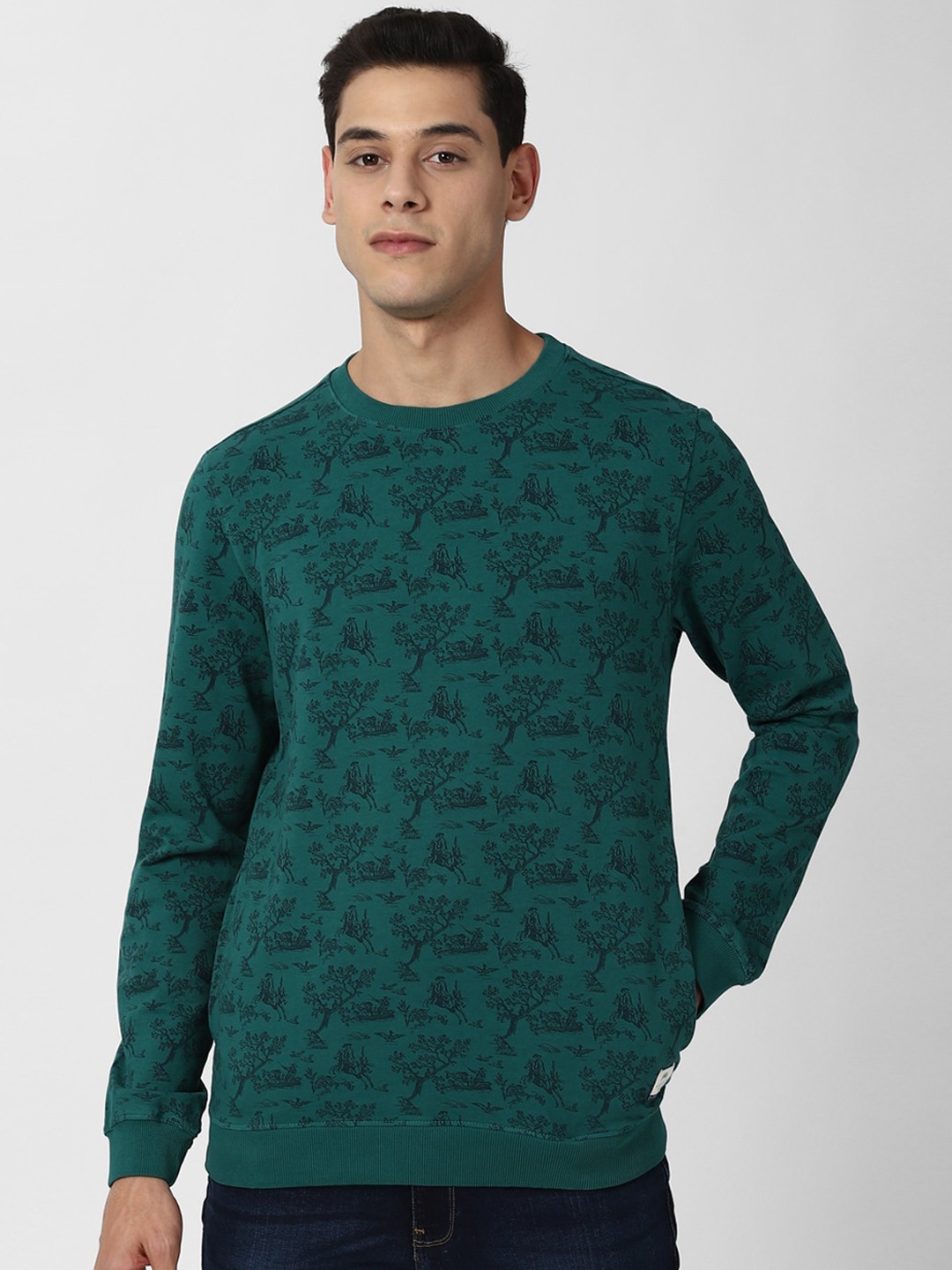 

Peter England Casuals Men Green Printed Sweatshirt