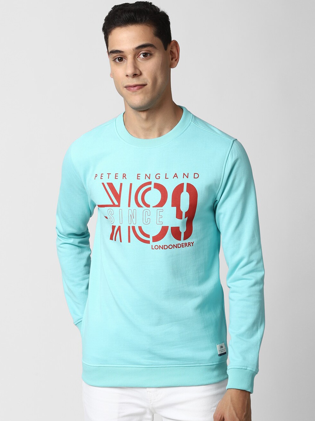 

Peter England Casuals Men Blue & Red Printed Sweatshirt