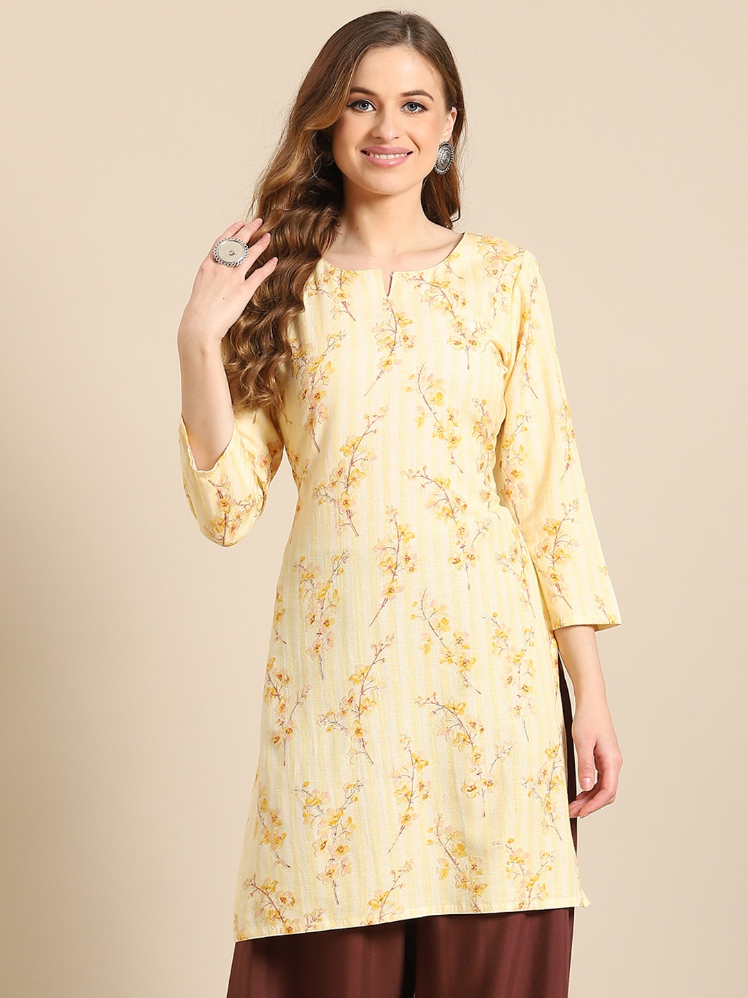 

Prakrti Yellow Floral Printed Flared Sleeves Kurti
